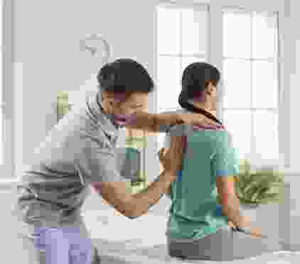Patient rehabilitation exercise session at PhysiPro